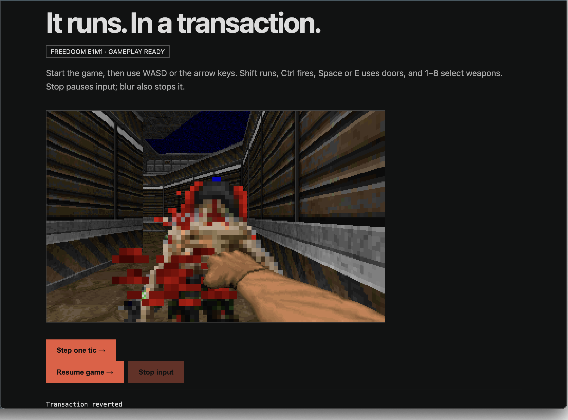 The cropped browser view shows a fist and blood in Freedoom E1M1, with Transaction reverted below the game.